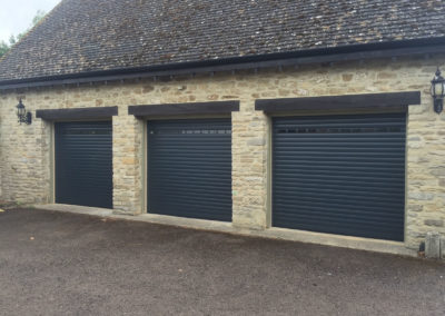 3 Anthracite Roller Doors with vision profiles