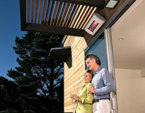 Picture of man and woman in under veranda with solar heater