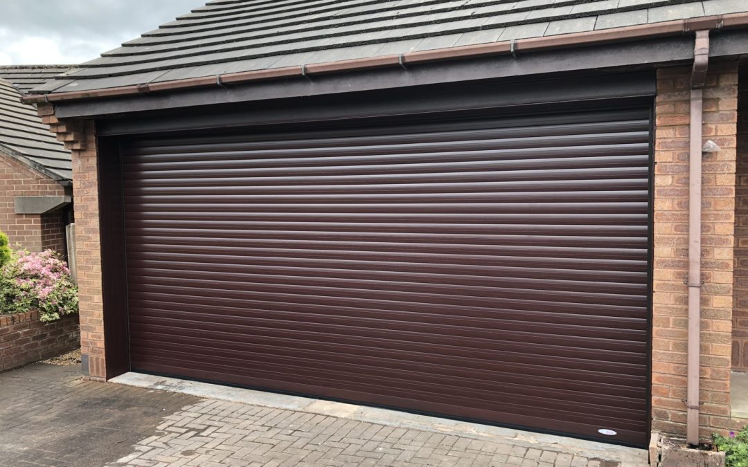 Converting two garage doors into one